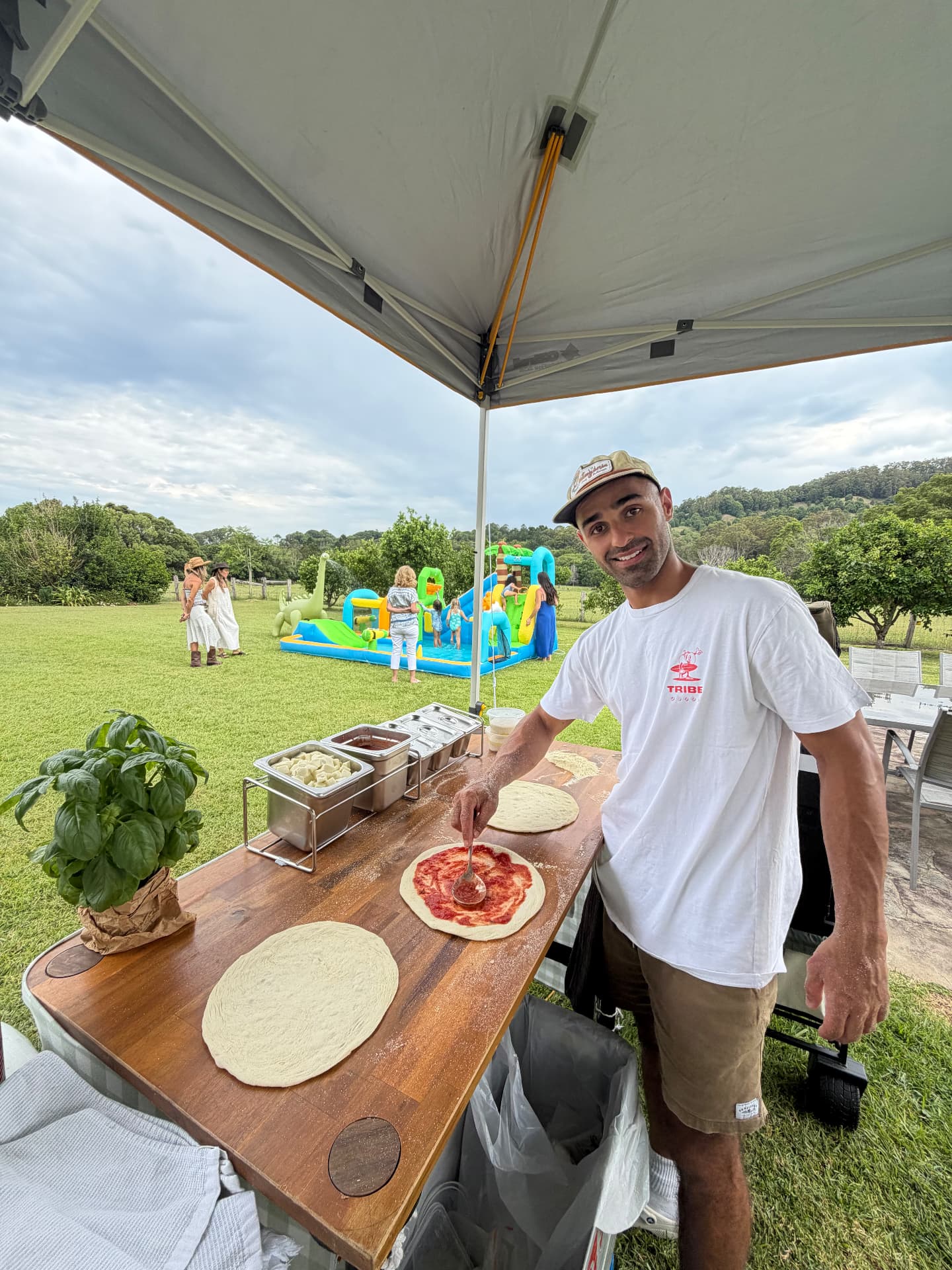 Tribe Pizza mobile catering setup with Gozney oven at a backyard party